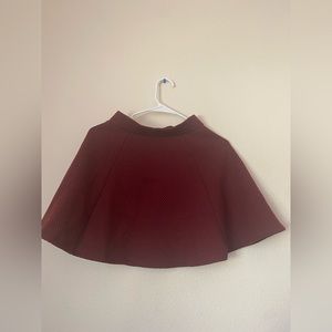 A red box pleat dress